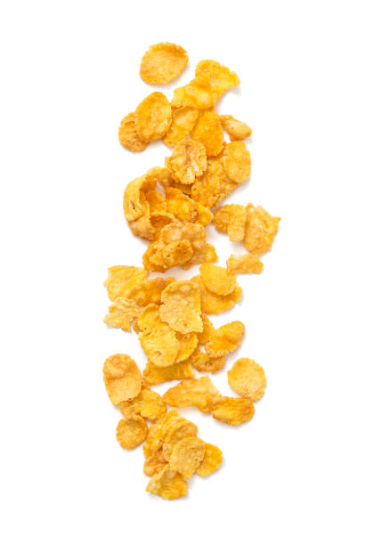 Corn flakes Healthy food concept -Corn flakes on white background corn flakes stock pictures, royalty-free photos & images