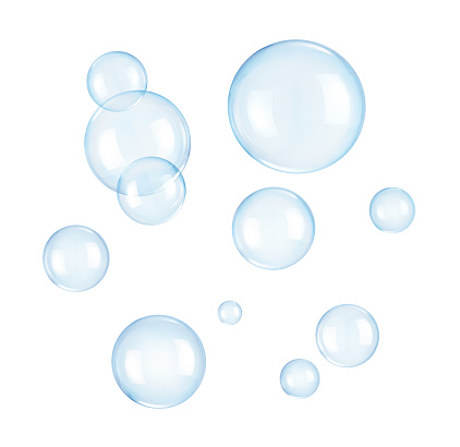 Burbujas de jabón sobre un fondo blanco photo