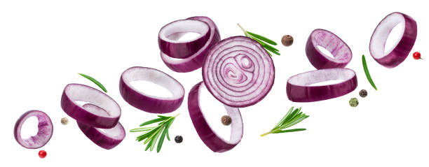 istock Sliced red onion rings isolated on white background with clipping path 1204013962
