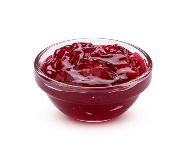 istock Berry jam isolated on white background with clipping path 1204013980