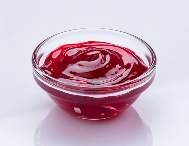 istock Berry jam isolated on white background with clipping path 1204013983