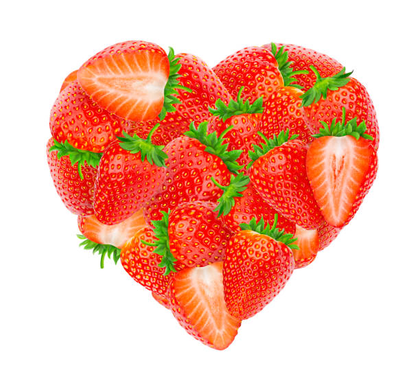 istock Heart made of strawberries isolated on white background 1204013995