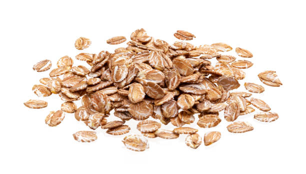 istock Pile of rye flakes isolated on white background 1204014136