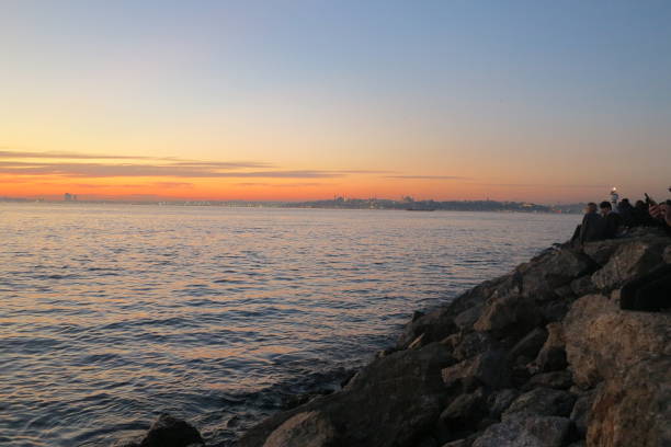 istock Kadikoy sea coast sunset sky Istanbul Turkey 1204016469