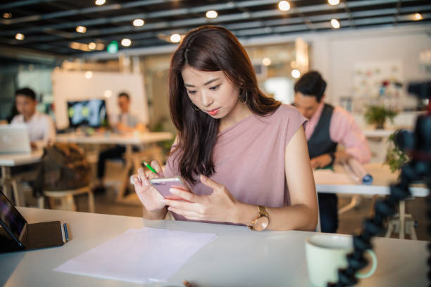 istock Woman in modern office 1204017986