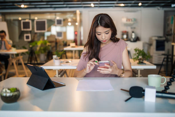 istock Woman in modern office 1204018023