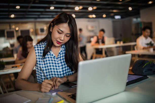 istock Woman in modern office 1204018818