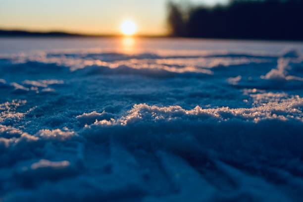 Sunset on a snowy lake in Russia