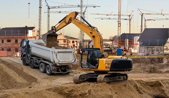 excavator at work in construction site