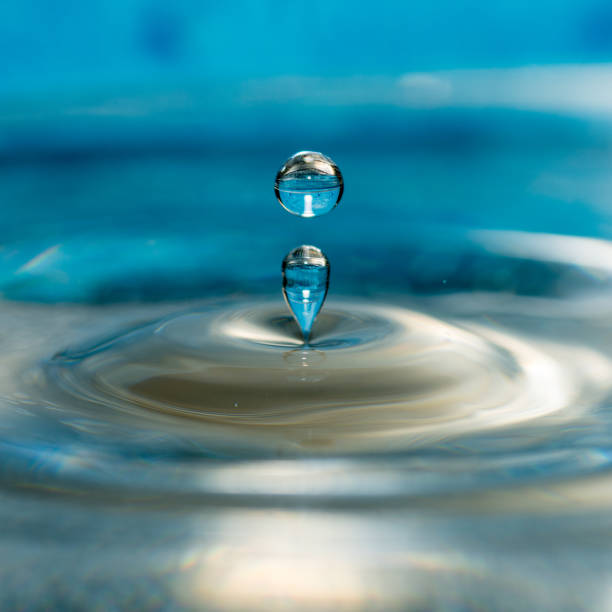 istock close up conceptual photo of water drops splashing 1204020795