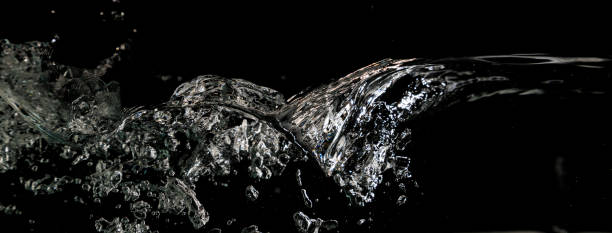 istock Splash of water. Isolate on black background 1204021559