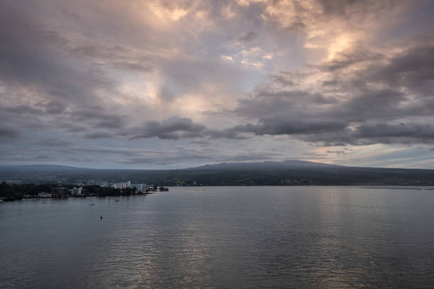 istock Spectacular lighter evening cloudscape over Hilo, Hawaii, USA. 1204024593