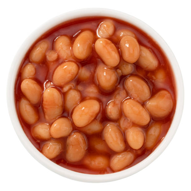istock white beans in tomato sauce isolated on white background 1204028153
