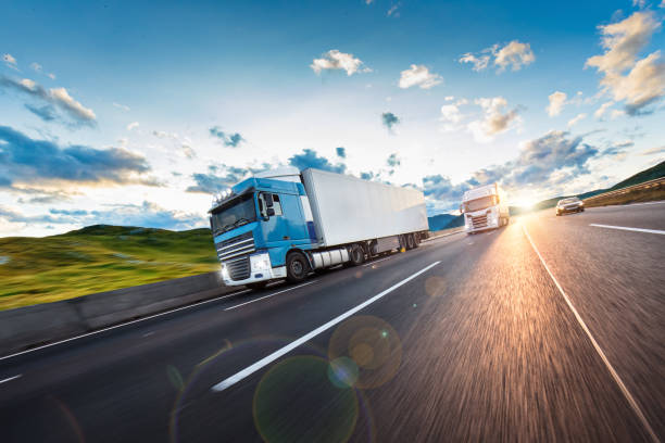 istock Truck with container on road, cargo transportation concept. 1204030740