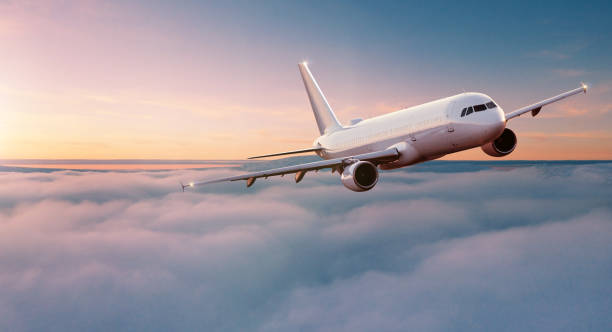 istock Commercial airplane jetliner flying above dramatic clouds. 1204030960