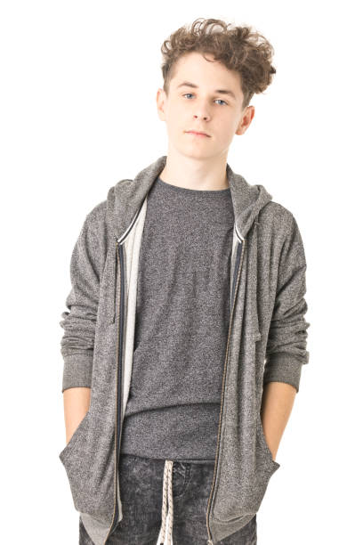 istock 12 years old boy isolated on white 1204031042
