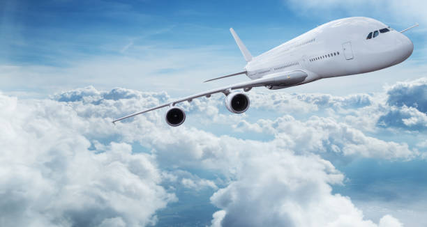 istock Huge two-storey passengers commercial airplane flying above dramatic clouds. 1204031858