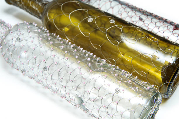 istock The three different wire brushed wine bottles.  The traditional decorative craft. In a white background. 1204038773