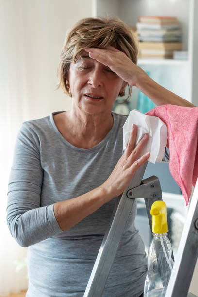istock Senior  woman cleaning home 1204040558