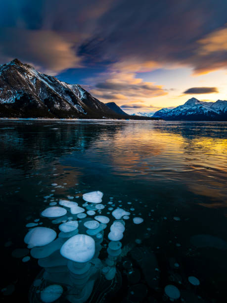 istock ice bubble and sunrise at Abraham Lake 1204041658