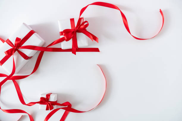 istock Christmas and New Year holiday background with gift boxes. 1204046244