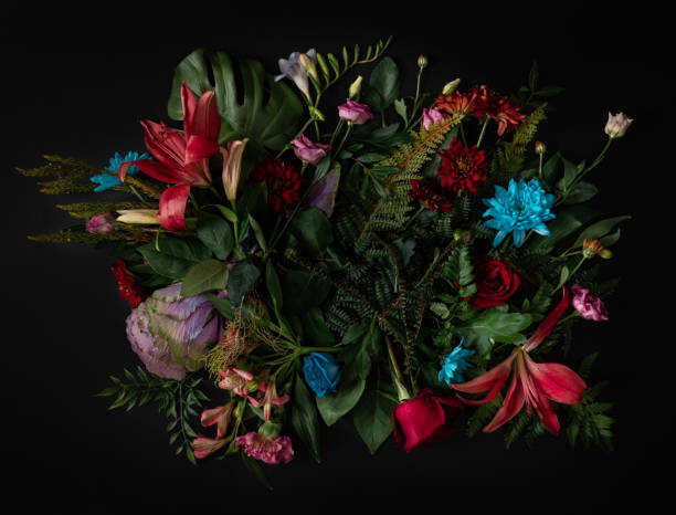 istock Creative layout made of flowers and leaves. Flat lay. 1204046288