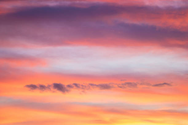 istock Red and yellow clouds in the sunset sky 1204049725