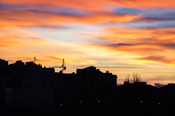 istock Red and yellow clouds in the sunset sky 1204049797