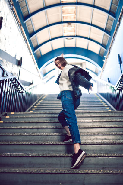 istock Female Walking Train Station Stairs To Platform 1204051733