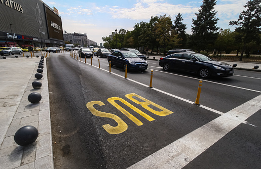 Bucharest, Romania - September 19, 2019: An empty bus lane in Unirii Square in Bucharest, Romania. This image is for editorial use only.