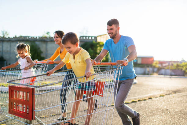 istock Family having fun after grocery shopping 1204054250