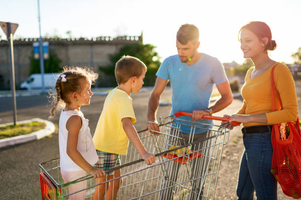 istock Family having fun after grocery shopping 1204054589