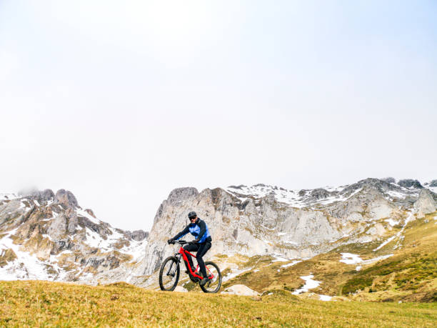 istock Man riding a mountain bike 1204055808