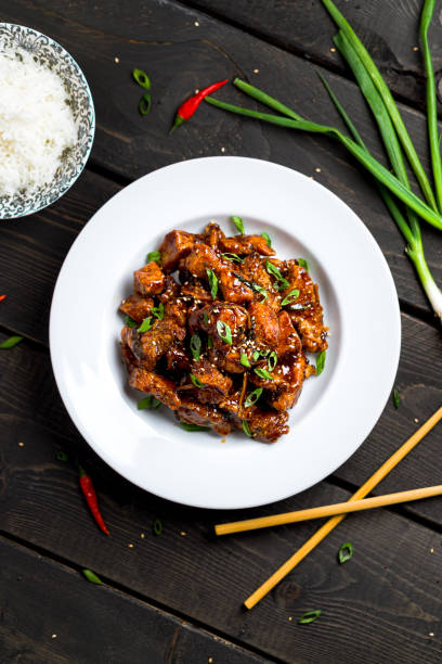 general tso's chicken vertical portrait top view. - chicken general tso food imagens e fotografias de stock