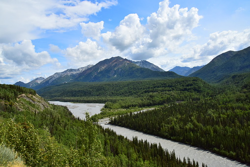 Matanuska River flows out of the northern Chugach Mountains as seen from route #1 , Alaska.