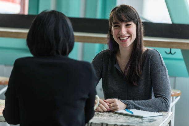 istock Two Women Business Meeting Hip Cafe 1204064517