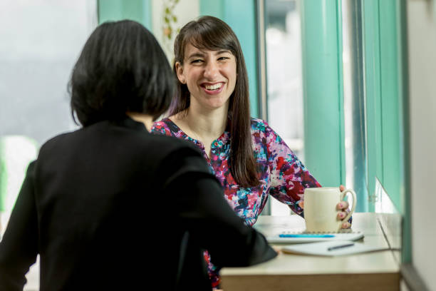 istock Two Women Business Meeting Hip Cafe 1204064608