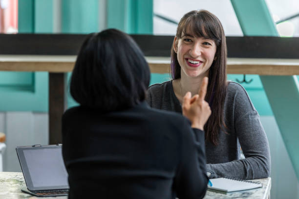 istock Two Women Business Meeting Hip Cafe 1204064949
