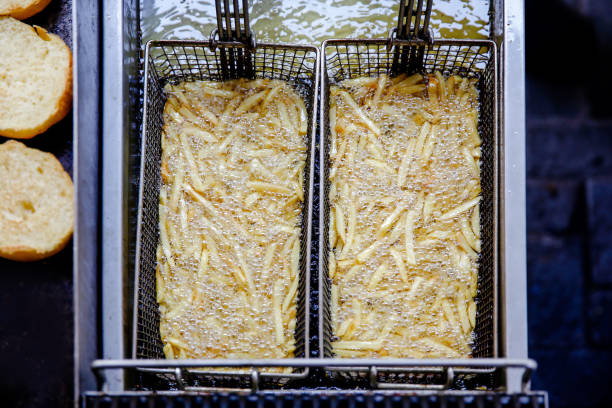 frites de français de la nancinage de friture - french fries fast food french fries raw raw potato photos et images de collection