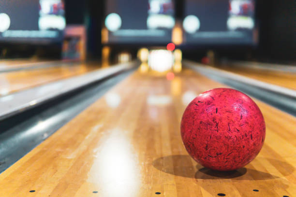 istock red bowling ball and blur background in bowling playground 1204067762