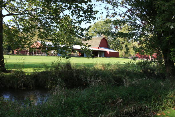 istock midwest farm barn buildings river 1204069104