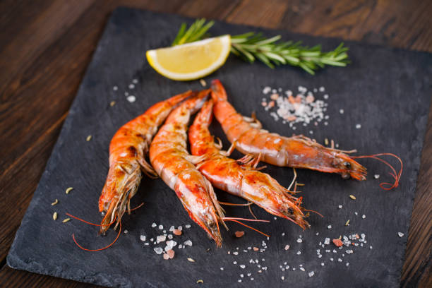 istock Barbeque grilled prawns with lemon and spices 1204073389