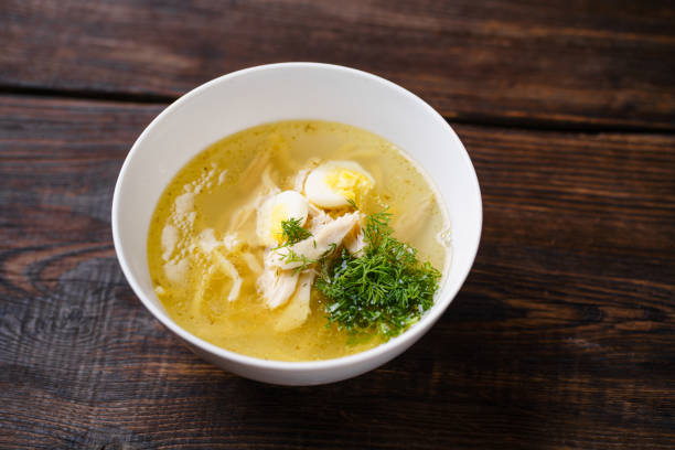 istock Hot chicken broth with fillet and boiled eggs 1204073504