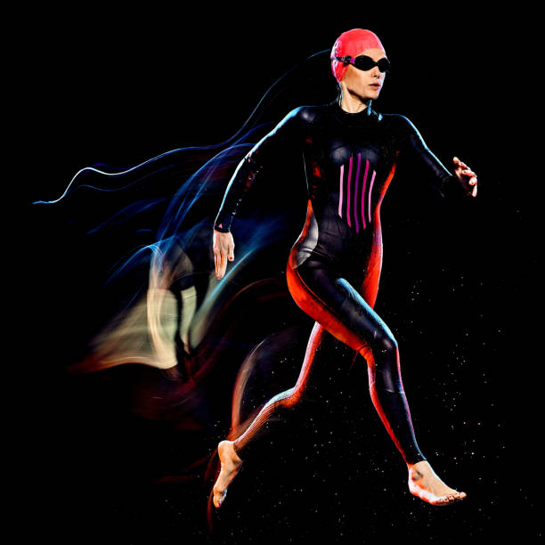 istock woman triathlon triathlete isolated black background 1204074369