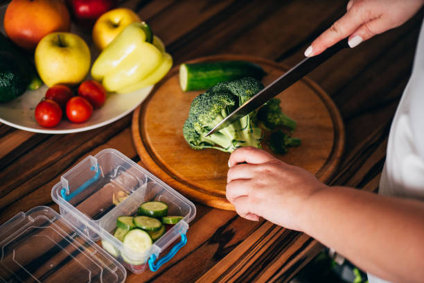 istock Woman preparing homemade low-calorie snacks 1204077349