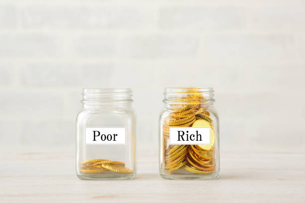 istock Coins in bottle with tags, financial gap images 1204080003