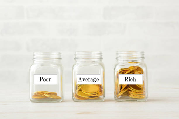 istock Coins in bottle with tags, financial gap images 1204080073