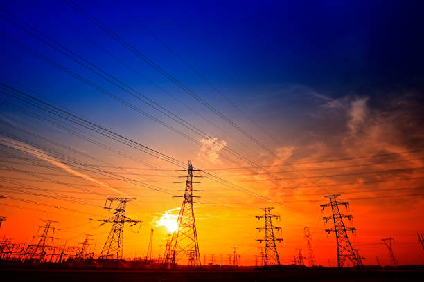 istock Electric tower, silhouette at sunset 1204081079
