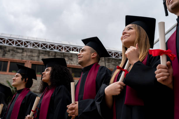 istock Students looking inspired at their graduation ceremony 1204089316