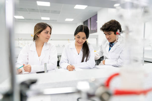 istock Group of STEM students in class at the lab 1204089404